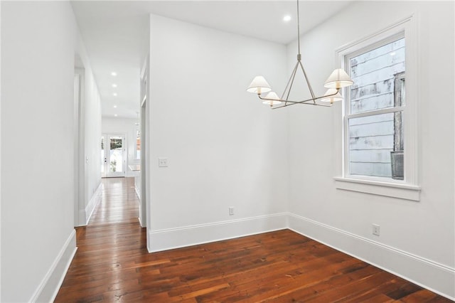 2623 Dauphine St, New Orleans, LA 70117 - unfurnished dining area featuring a chandelier, dark wood-style flooring, and recessed lighting