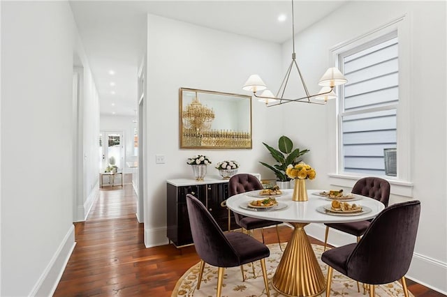 2623 Dauphine St, New Orleans, LA 70117 - dining area with a chandelier, dark wood-style floors, and recessed lighting