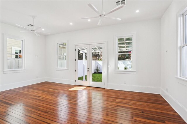 2623 Dauphine St, New Orleans, LA 70117 - empty room featuring french doors, ceiling fan, hardwood / wood-style floors, and recessed lighting