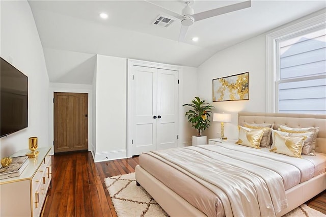 2623 Dauphine St, New Orleans, LA 70117 - bedroom with vaulted ceiling, dark wood-style flooring, a closet, ceiling fan, and recessed lighting
