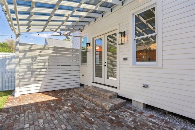2623 Dauphine St, New Orleans, LA 70117 - deck with french doors, a pergola, and a patio