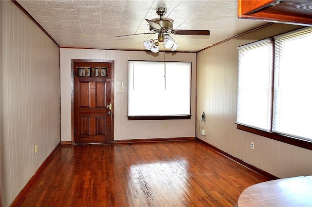 607 Central Ave, Westwego, LA 70094 - unfurnished dining area with crown molding, wood finished floors, and plenty of natural light
