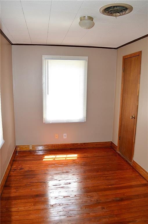 607 Central Ave, Westwego, LA 70094 - unfurnished room featuring visible vents, baseboards, and wood finished floors