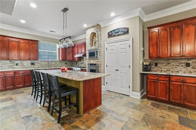 kitchen featuring stainless steel appliances, ornamental molding, and decorative backsplash