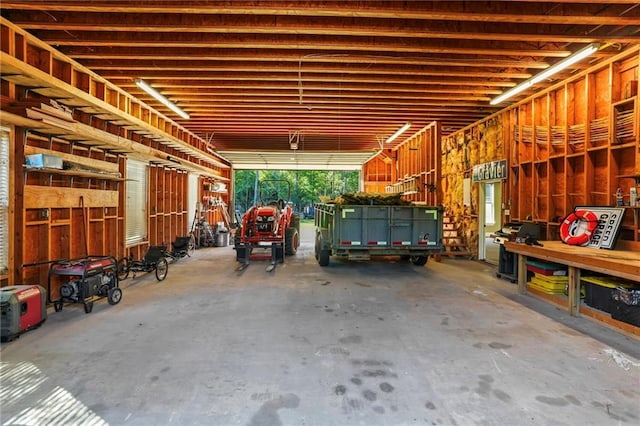 garage with a workshop area