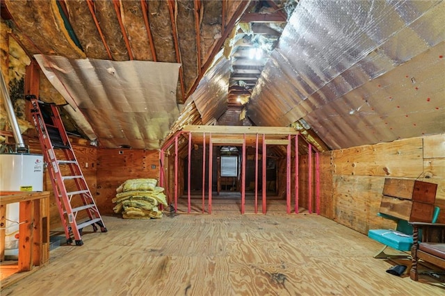 unfinished attic with water heater