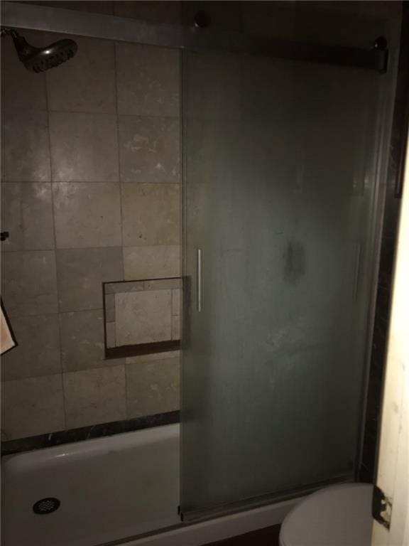 219 Queen Anne Dr, Slidell, LA 70460 - bathroom featuring a shower stall and toilet
