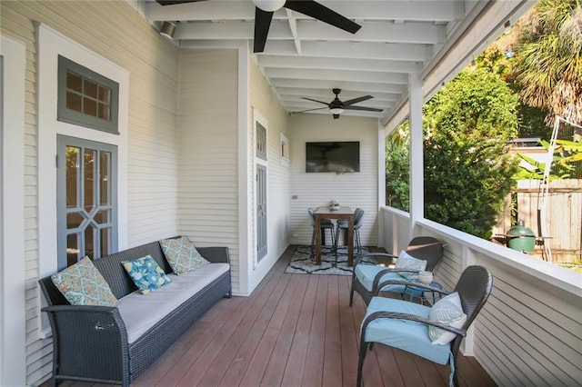 wooden deck with ceiling fan