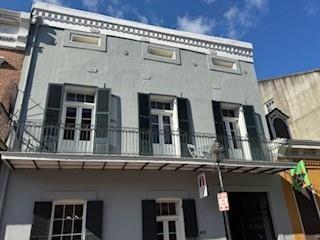 415 Burgundy St Unit 3A, New Orleans, LA 70112 - view of property with a garage