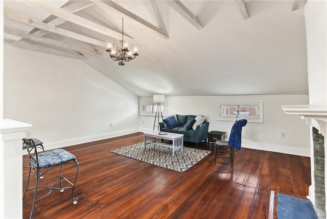 415 Burgundy St Unit 3A, New Orleans, LA 70112 - living room with baseboards, wood-type flooring, a fireplace with flush hearth, and a chandelier