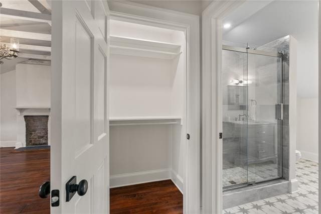 415 Burgundy St Unit 3A, New Orleans, LA 70112 - walk in closet featuring a chandelier