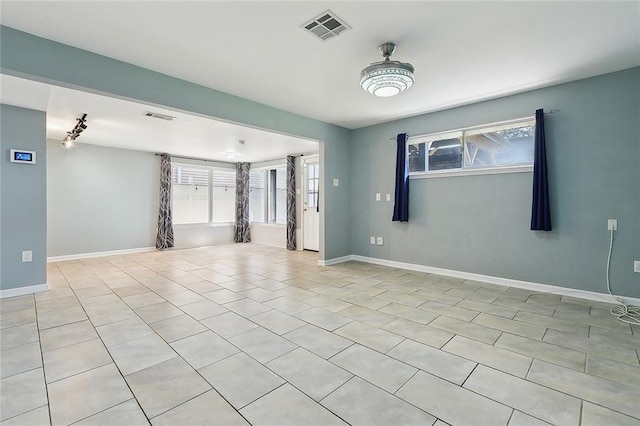3408 Lake Villa Dr, Metairie, LA 70002 - unfurnished living room featuring light tile patterned floors and baseboards