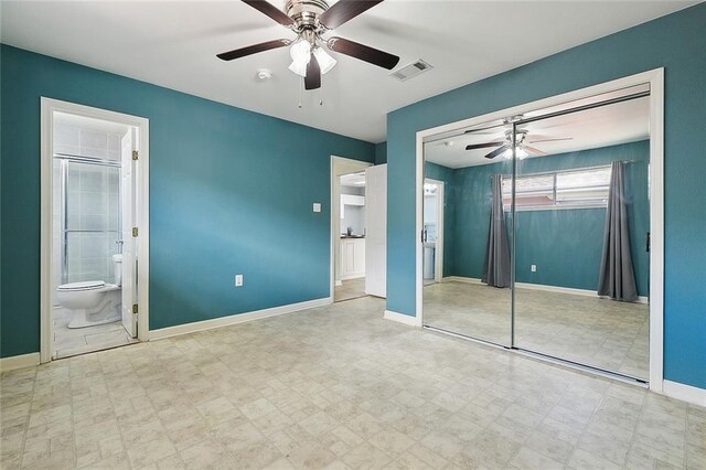 3408 Lake Villa Dr, Metairie, LA 70002 - unfurnished bedroom with a closet, tile patterned floors, ceiling fan, and connected bathroom
