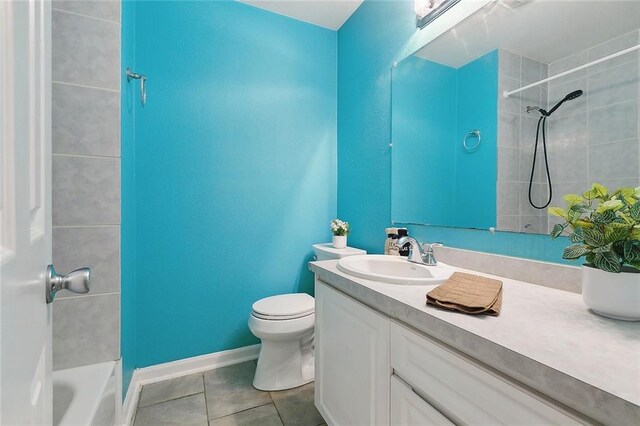 3408 Lake Villa Dr, Metairie, LA 70002 - unfurnished bedroom with two closets, wood finished floors, and a ceiling fan