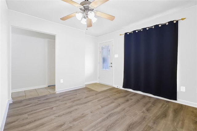 3408 Lake Villa Dr, Metairie, LA 70002 - spare room featuring wood finished floors and ceiling fan