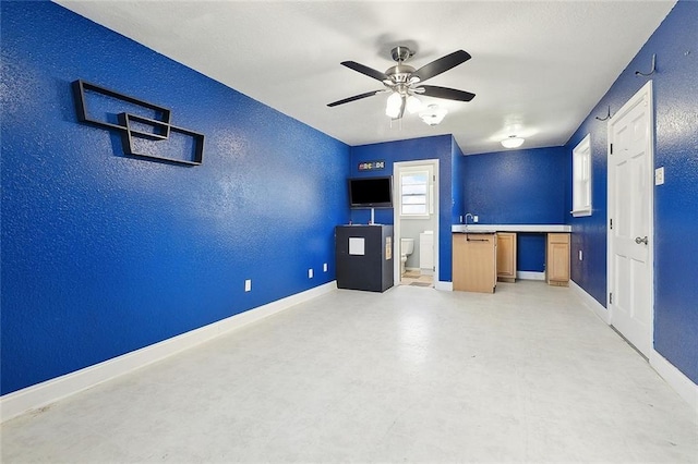 3408 Lake Villa Dr, Metairie, LA 70002 - unfurnished office featuring a ceiling fan and concrete floors