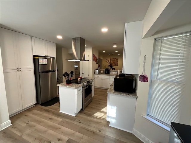 420 Michigan Ave, Slidell, LA 70458 - kitchen featuring stainless steel appliances, extractor fan, light wood-type flooring, white cabinets, and light stone counters