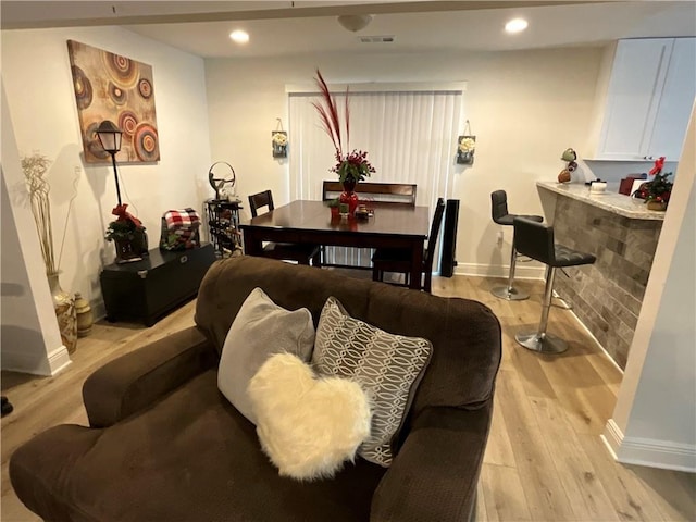 420 Michigan Ave, Slidell, LA 70458 - living area with light wood-type flooring, baseboards, and recessed lighting