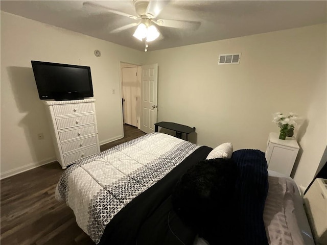 420 Michigan Ave, Slidell, LA 70458 - bedroom featuring dark wood-style flooring, baseboards, and ceiling fan