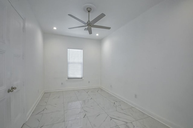 unfurnished room featuring baseboards, a ceiling fan, marble finish floor, and recessed lighting