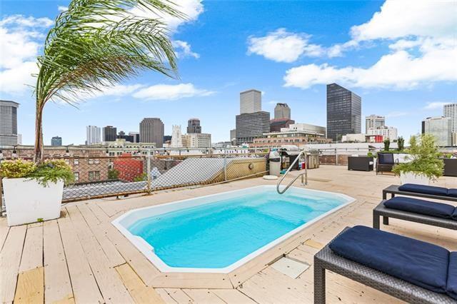 view of swimming pool featuring a city view