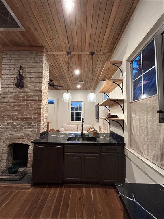 7713 Zimpel St, New Orleans, LA 70118 - dining space with wood ceiling, a ceiling fan, stairs, light wood-style flooring, and baseboards