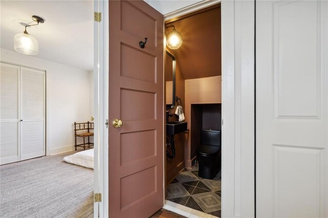 7713 Zimpel St, New Orleans, LA 70118 - bedroom featuring an AC wall unit, vaulted ceiling, carpet, and baseboards