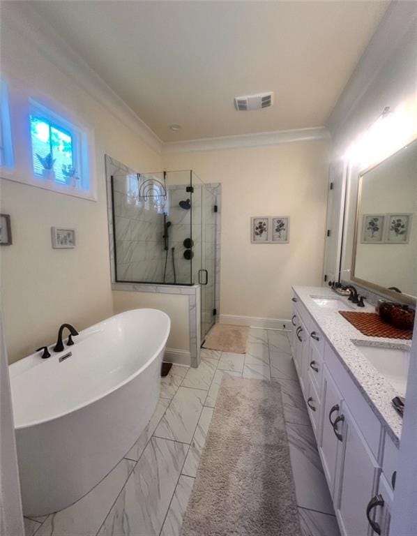 bathroom featuring a shower stall, ornamental molding, visible vents, a sink, and a freestanding bath