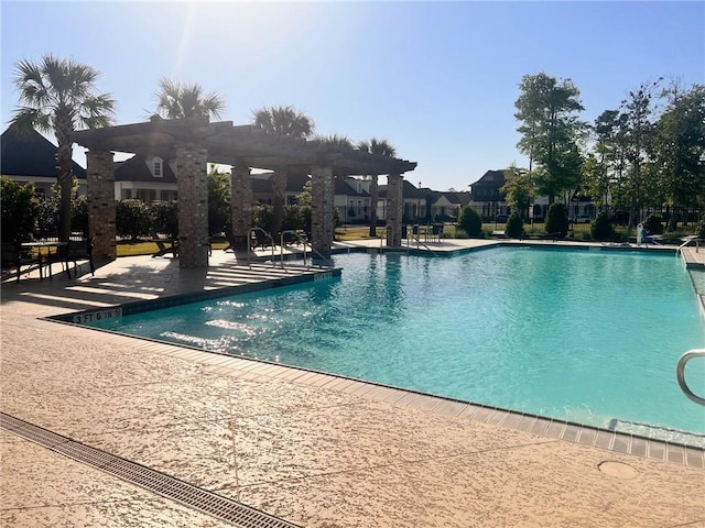 pool with a patio area