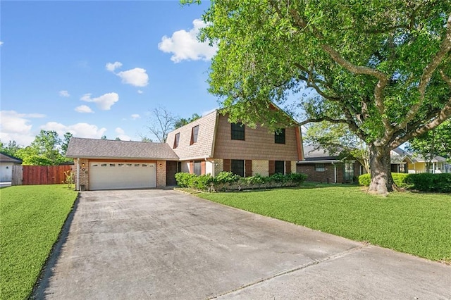 106 Somerset Rd, La Place, LA 70068 - tri-level home featuring a gambrel roof, driveway, a garage, and a front lawn