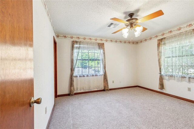 106 Somerset Rd, La Place, LA 70068 - spare room featuring ceiling fan, visible vents, a textured ceiling, and carpet floors