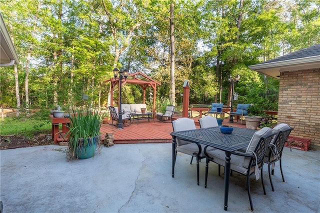 view of patio with outdoor dining area and an outdoor hangout area