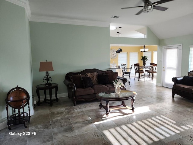 637 Foxwood Ln, La Place, LA 70068 - living room featuring baseboards, crown molding, visible vents, lofted ceiling, and ceiling fan with notable chandelier
