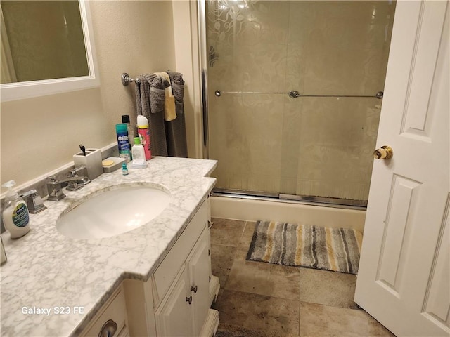 637 Foxwood Ln, La Place, LA 70068 - bathroom with a shower stall and vanity