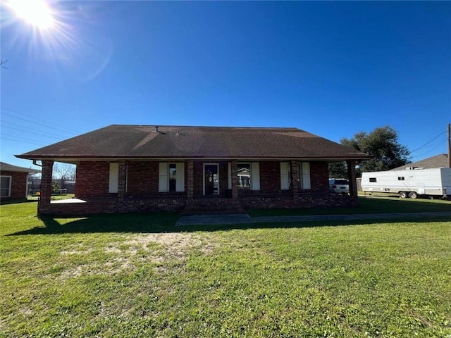 721 Central Ave, Reserve, LA 70084 - single story home featuring a front lawn and brick siding