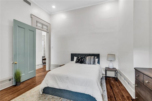 818 Bourbon St Unit 2A, New Orleans, LA 70116 - bedroom featuring wood finished floors, ornamental molding, baseboards, and recessed lighting