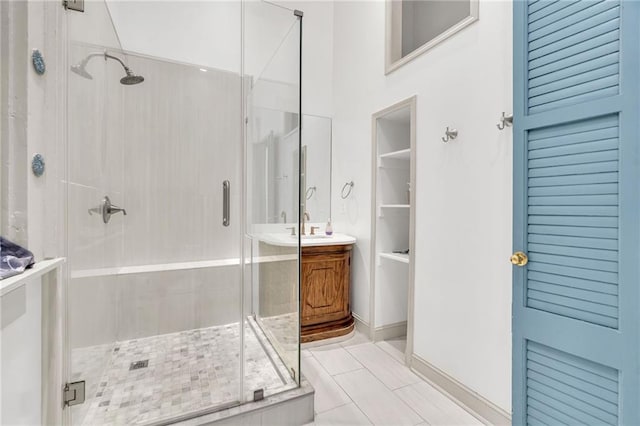 818 Bourbon St Unit 2A, New Orleans, LA 70116 - full bath featuring a stall shower, vanity, and a closet