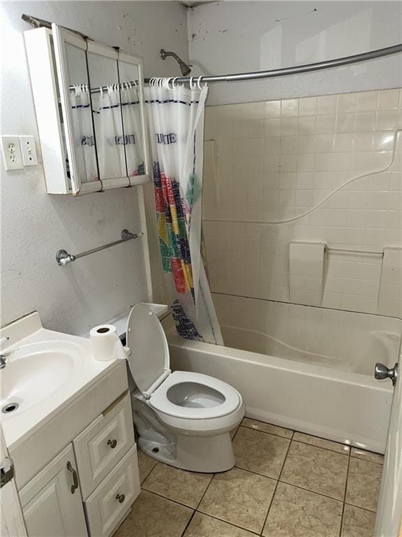 bathroom with toilet, shower / tub combo, vanity, and tile patterned flooring