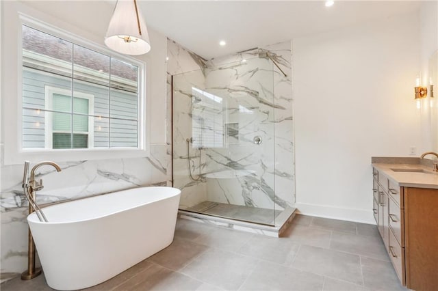 6371 Louis Xiv St, New Orleans, LA 70124 - bathroom with a marble finish shower, vanity, a soaking tub, and recessed lighting