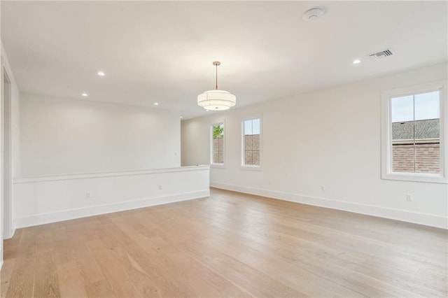 6371 Louis Xiv St, New Orleans, LA 70124 - spare room with healthy amount of natural light, light wood finished floors, recessed lighting, and a smoke detector