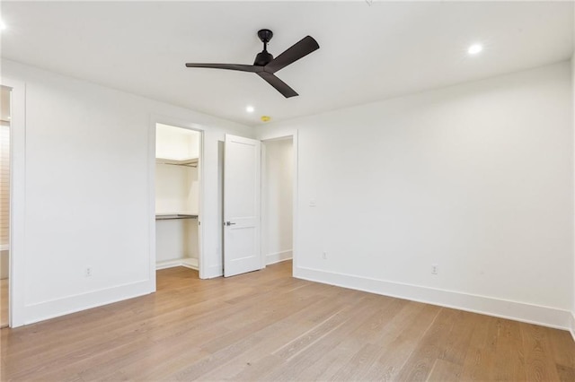 6371 Louis Xiv St, New Orleans, LA 70124 - unfurnished bedroom featuring light wood finished floors, recessed lighting, a spacious closet, a ceiling fan, and a closet