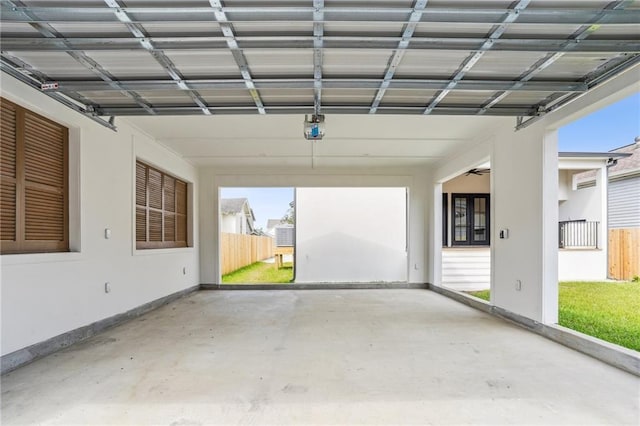 6371 Louis Xiv St, New Orleans, LA 70124 - garage featuring a carport and a wall mounted AC