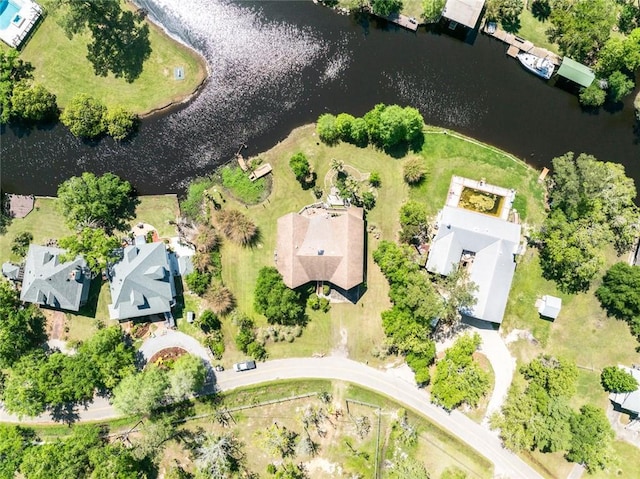 bird's eye view with a water view