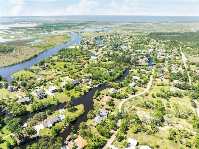 aerial view featuring a residential view and a water view