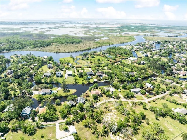 aerial view featuring a water view and a residential view