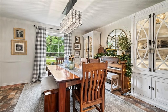 616 Marilyn Dr, Mandeville, LA 70448 - dining space with stone finish floor and ornamental molding