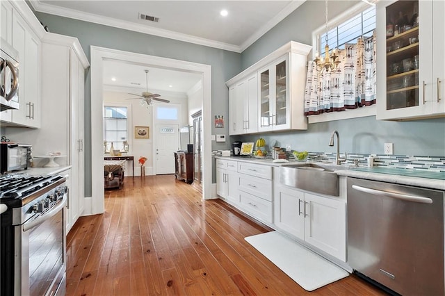 727 N Salcedo St, New Orleans, LA 70119 - interior space with ceiling fan, dark wood finished floors, visible vents, appliances with stainless steel finishes, and a sink