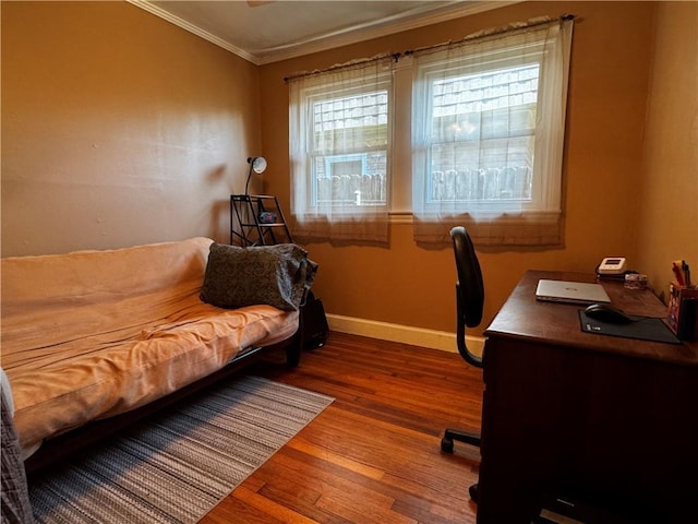 office with crown molding, baseboards, and wood finished floors