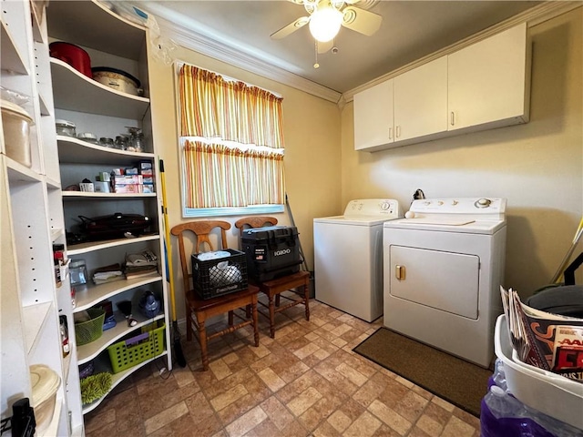 laundry area with brick patterned floor, ceiling fan, crown molding, cabinet space, and washer and clothes dryer