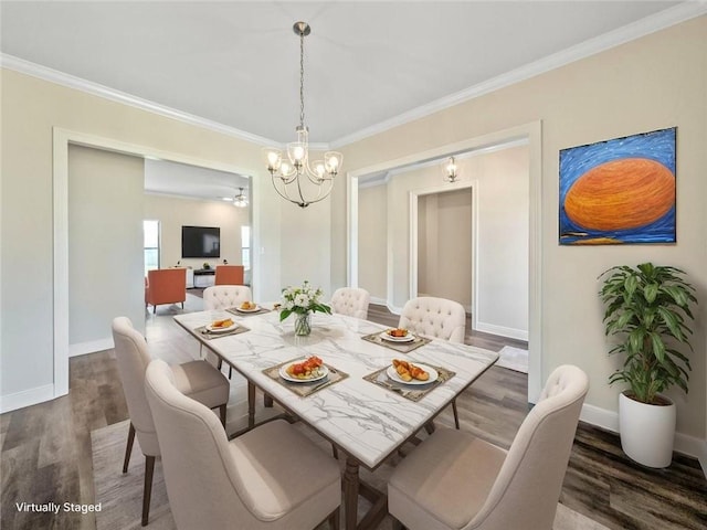 9508 E Terran Ln, Waggaman, LA 70094 - dining area featuring a chandelier, crown molding, and wood finished floors
